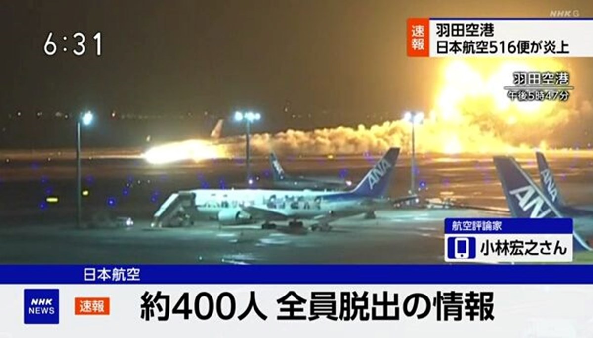 SON DAKİKA HABERİ: Tokyo'daki Haneda Havalimanı'nda uçak alev aldı